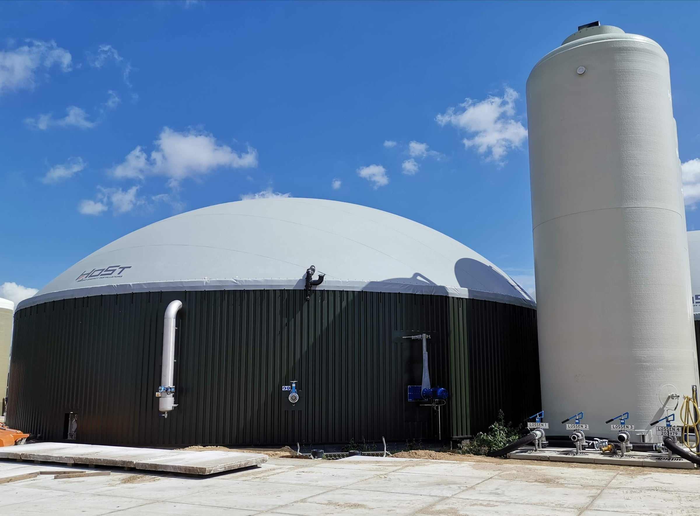 Biogas digester dome and storage tank at a renewable gas plant
