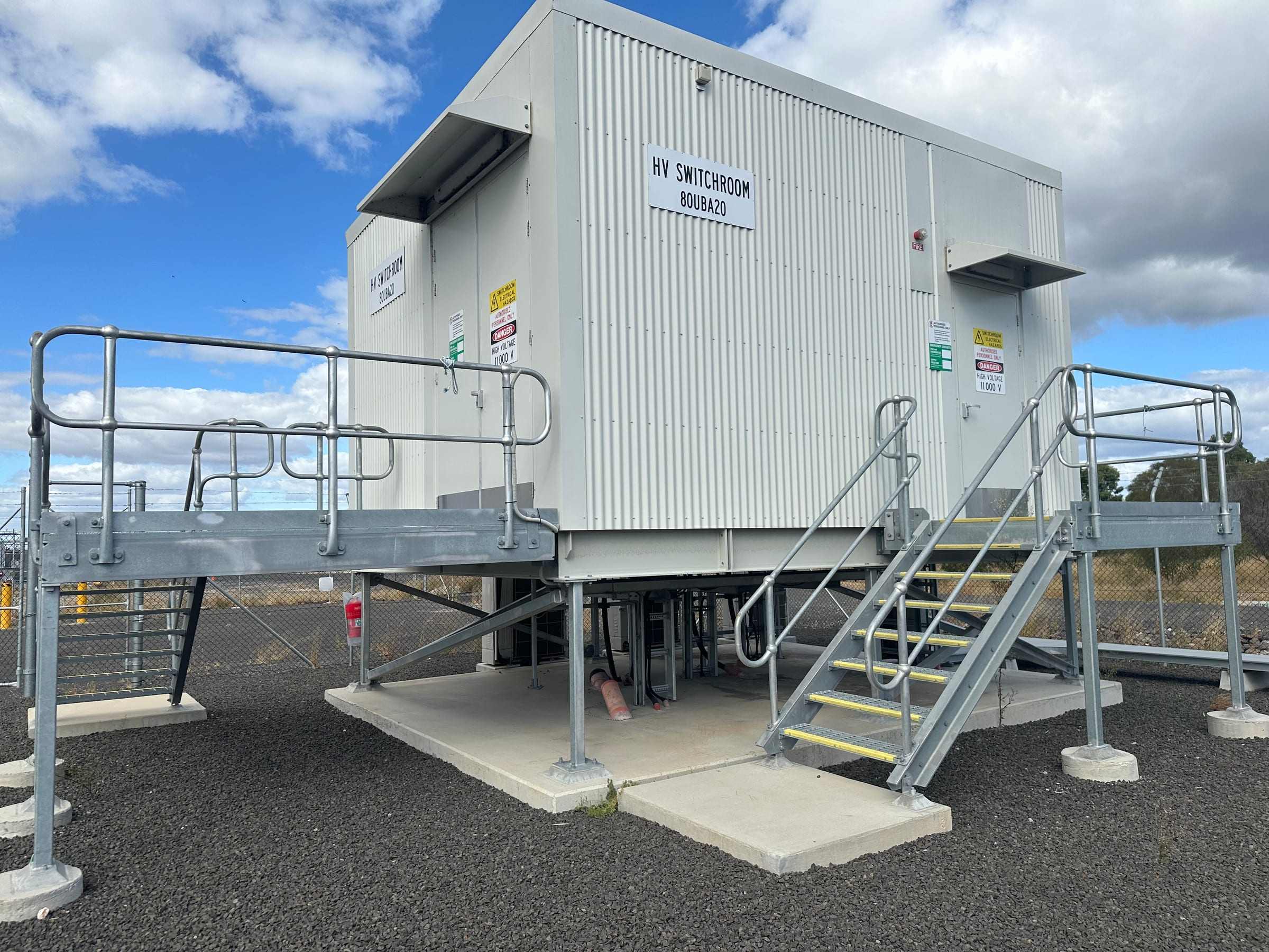 HV switchroom building with stairs and platforms on site