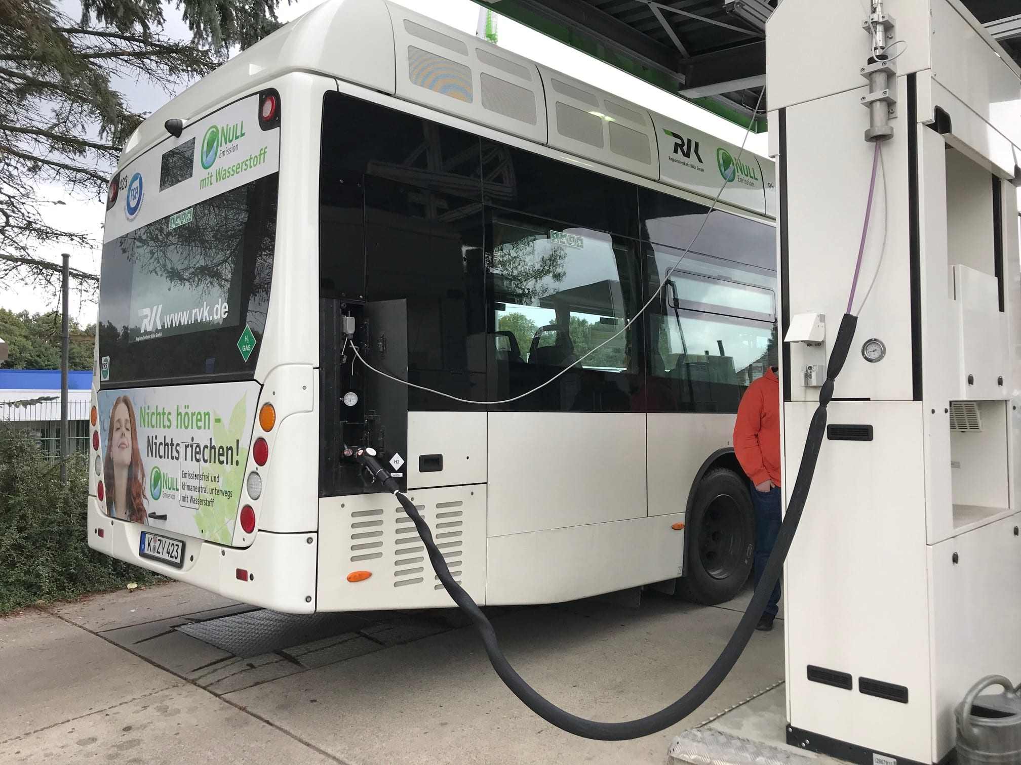 Hydrogen bus being refuelled at a dispenser