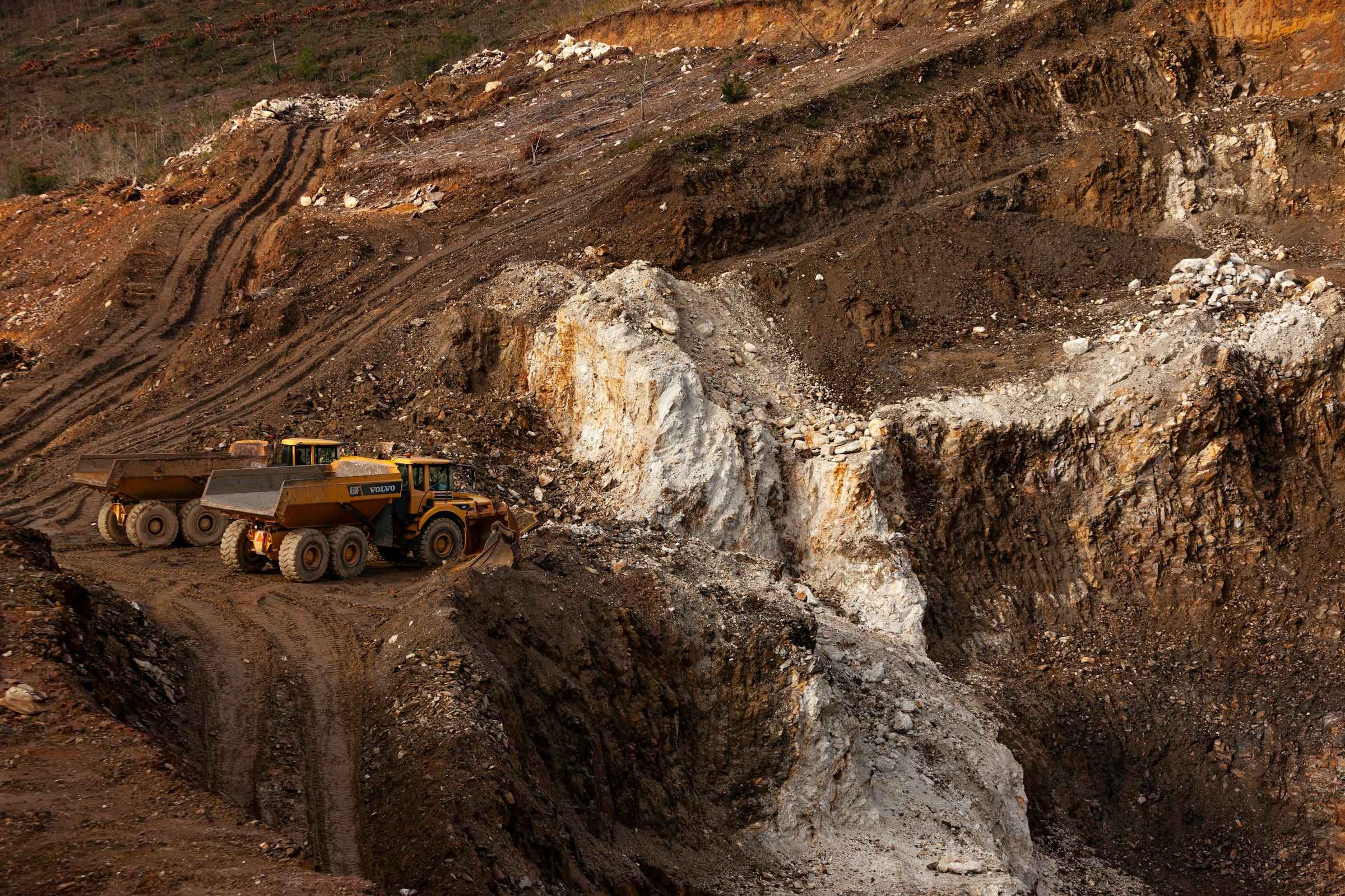 Haul trucks working in an open-cut mine